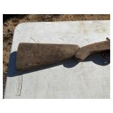 Rustic Double-Barrel Shotgun with Wooden Stock