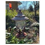 Collection of Outdoor Bird Feeders and Lantern