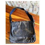 Handcrafted Leather Bag with Floral Embellishments