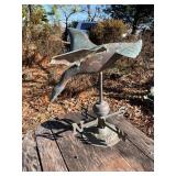 Patinated Metal Goose Weathervane on Engraved Rota