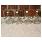 Set of Four Leaf-Shaped Glass Bottles with Plastic