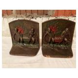 Pair of Cast Iron Bookends with Relief Figures and