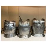 Set of Three Metal Breastplates with Distinct Desi