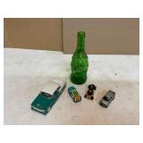 Buddha Bottle and 4 Toy Cars Buddha Bottle and 4 Toy Cars