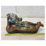 Reclining Cherub Sculpture in Patinated Finish Reclining Cherub Sculpture in Patinated Finish