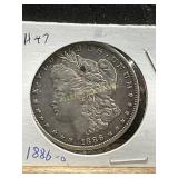 AU 1886-O Morgan Silver Dollar