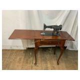 Singer Sewing Machine in Wooden Cabinet