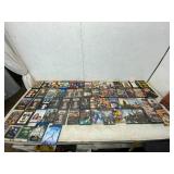 66 DVDs and VHS Tapes