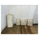 Seven Wooden Cabinet Doors