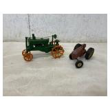 Two Cast Iron Farm Tractors