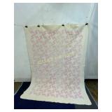 Light Pink and White Patchwork Quilt