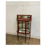 Curved Glassï¿½ Cabinet with Mirror Back