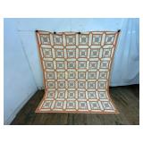 Hand-Stitched Quilt with Geometric Design