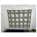 Hand-Stitched Blue and White Quilt