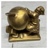Gold-Colored Figurine with Globe Motif