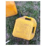 Set of Yellow Plastic Diesel Fuel Containers