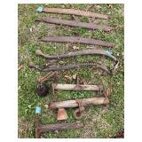 Collection of Rustic Metal and Wooden Farm Tools