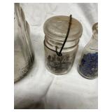 Collection of Four Glass Containers and Bottles
