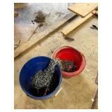 Two Buckets Containing Metal Chains