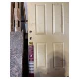 Granite Slab and Steel Entry Door