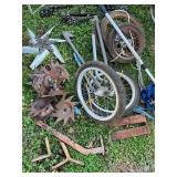 Collection of Old Wheels, Tines, and Tools