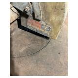 Industrial Metal-Cutting Saw on Steel Base