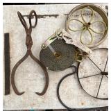 Assorted Industrial Tools and Metal Wheels