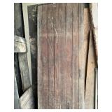 Distressed Wooden Barn Door with Weathered Finish