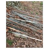 Assorted Rusted Metal Pipes and Rods