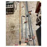 Collection of Tools Including Bar Clamps and Push
