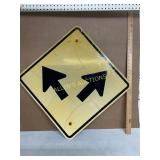 Yellow Metal Road Sign with Two Arrows