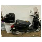 Black Vespa Scooter by Piaggio With Top Box