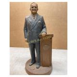 Painted Plaster Sculpture of Man at Podium