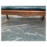 Wood-Framed Settee With Caned Backrest