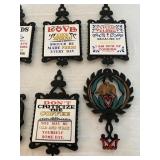 Set of Cast Iron Wall Plaques with Decorative Desi