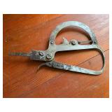 Metal Caliper-Style Tool with Adjustment Mechanism