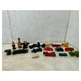 18 Glass and Plastic Vehicles and Novelty Items