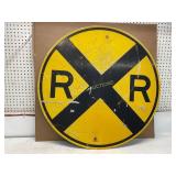 Round Yellow Railroad Crossing Sign