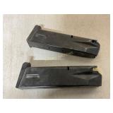 Two Metal 9mm Magazine Clips