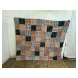 Hand-Crafted Patchwork Quilt with Plaid Patterns