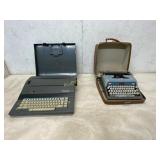 Two Portable Typewriters with Cases