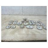 25-Piece Porcelain Tea Set with Floral Motif