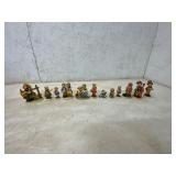 12 Hummel-Style Ceramic Figurines