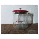 House of Lance Glass Jar with Red Lid