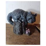 Concrete Sculpture of Cat on Tree Stump