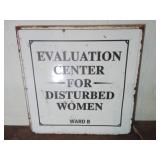 Metal Sign with Printed Text ï¿½Evaluation Centerï¿½