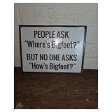 Metal Sign with Bigfoot-Themed Text