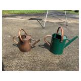 Copper and Green Metal Watering Cans