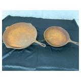 Two Rusted Cast Iron Skillets