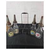 Four Oil Bottles with Metal Holder